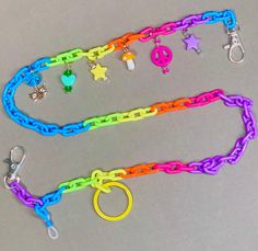 "You'll be feelin' alright with this customized body chain! Two sizes available: belly/body chain (20\"-40\"), shoulder or bag strap (6\"-20\") - it features a row of colorful charms + REMOVABLE utilities: keyring, sunglasses loop, plastic lobster clip & two large swivel lobster clasps on each end. The plastic chain links are also adjustable + removable for a versatile accessory!  **I will send you a preview of your jewelry to be approved prior to shipping so any changes can be made. Specify your color/metal preference in the notes box and any other details you want (charm preferences etc).   *The piece pictured measures to 27\" & includes a silver chain double extender in  double the length. (Specify your measurements in the notes. Silver extender is only pictured on model [me]. Extender Trendy Adjustable Body Chain For Festivals, Adjustable Body Chain As Summer Gift, Adjustable Festival Body Chain With Chain Strap, Summer Body Chain With Adjustable Chain As A Gift, Trendy Summer Waist Chain As A Gift, Adjustable Chain Strap Body Chain Gift, Roller Derby Drills, Kid Core Outfits, Im Good