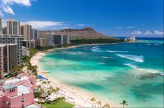 an aerial view of the beach and ocean in waikiki, oahua