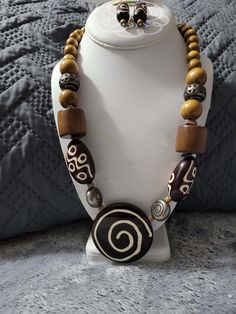 organic, tribal style light wood beads and ribbon necklace, casual to dressy style African Necklaces, Necklace Casual, Handmade Statement Necklace, Dressy Style, African Necklace, Ribbon Necklace, Dressy Fashion, African Jewelry, Hand Jewelry