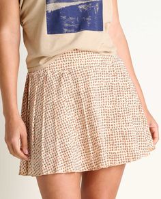 This is a magic moment - our weightless Sunkissed fabric in a skort (skirt with hidden benefit of shorts) that is sporty enough for the courts and stylish enough for lunch. Casual Tiered Skirt With Built-in Shorts, Casual Flowy Skort With Built-in Shorts, Spring Tiered Skirt With Built-in Shorts, Beige Pleated Tennis Skirt For Summer, Casual Flowy Skirt With Built-in Shorts, Casual Tennis Skirt With Elastic Waistband For Day Out, Flowy Bottoms With Built-in Shorts For Day Out, Tiered Mini Skirt With Built-in Shorts For Spring, Summer Beige Pleated Skort