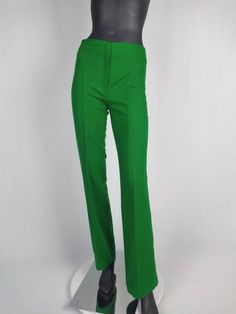 Fabulous 70s vintage flared pants/ bell-bottoms by Gaston Jaunet. Made from bright grass green wool. Featuring front zip closure, top stitch details. Unlined. Made in France. SIZE TAG: F40, in modern sizing more like F38. Please check measurements below. FABRIC CONTENT: 85% wool 15% polyamide CONDITION: excellent. MEASUREMENTS (taken flat, not doubled): Waist: 36 cm / 14 1/4" Hip: 48 cm / 19" Front rise: 26 cm / 10 1/4" Inseam: 82 cm / 32 1/2" Flare: 27 cm / 10 3/4" Please do not hesitate to contact me if you have any questions. Vintage Green Wide-leg Bottoms, Vintage Flare, Navy Linen, Bell Bottom Pants, Sonia Rykiel, Grass Green, Womens Pants, Satin Skirt, Flared Pants