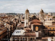 an aerial view of some buildings in the city