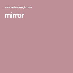 the word mirror is written in white on a pink background