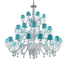 a white chandelier with blue shades hanging from it's center point,