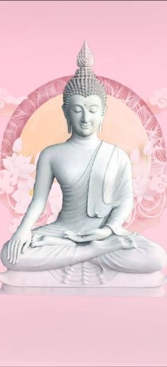 a white buddha statue sitting in front of a pink background