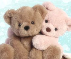 two teddy bears sitting next to each other on a blue and white background with bubbles