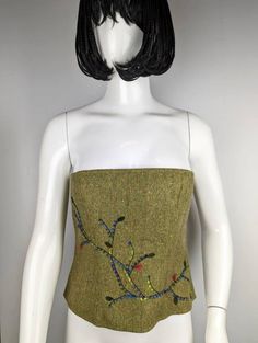 "Super cool vintage bustier from Kenzo 😍 Tweed is not a fabric that jumps to mind when you think of a strapless bustier top, but look how well it can work. Kenzo shows that there is no reason why any particular fabric cannot be used in new ways. Size tag (fits like L-XL) Condition 9/10 (very good vintage condition) Made in France Underarm to underarm - cm/\" Length from the front - cm/\" Waist - cm/\" All measurements taken with garment lying flat. Vintage sizes vary greatly! We recommend compa Spring Green Fitted Corset, Fitted Green Corset For Spring, Vintage Fitted Corset For Fall, Vintage Fall Corset, Vintage Bustier, Folk Lore, Strapless Bustier, Corset Lingerie, Brand Clothing