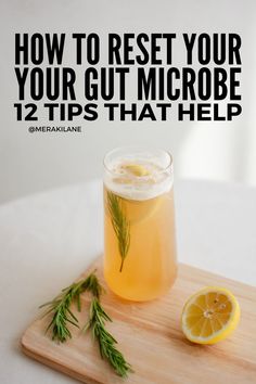 a lemon and rosemary drink on a cutting board with the words how to rest your gut microbe 12 tips that help