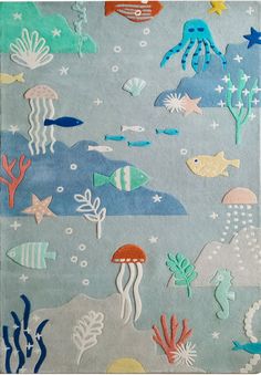 an area rug with sea animals and fish on it