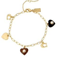 Coach Multiheart Charm Bracelet Delicate Paper Clip Chain Bracelet Mixed Media Charms Detailed With Dark And Light Wooden Hearts With Small Pearl Accent Signature Sculpted C's And Metal Heart Set In Gold-Tone Brass Metal Lobster Clasp Closure Includes Coach Pouch. Length Approx. 7"+ 2" Extender Width Approx. 0.1" Charm Drop Approx. 0.25 -0.4" Depth Approx. 0.25" New In Jewelry Pouch Coach Jewelry Bracelet Gift, Coach Bracelet Jewelry Gift, Coach Heart Charm Heart Jewelry, Coach Heart Charm Jewelry, Classic Coach Jewelry For Gifts, Coach Elegant Heart-shaped Jewelry, Elegant Coach Heart-shaped Jewelry, Elegant Coach Heart Shaped Jewelry, Coach Elegant Heart Jewelry