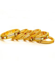 Buy Indian Kada bangles online! Ladies' gold bangle jewelry near me. Ruby bangle design with Kundans on gold bangles. Various Traditional gold bangle designs are available. Indian bridal jewelry made with love. Handcrafted Indian jewelry in Bay Area, San Francisco, California, USA. Now shipping worldwide! Gold Bangle Designs, Indian Gold Bangles, Kada Bangles, Gold Bangles Indian, Indian Bridal Jewelry, Ruby Bangles, Bangle Design, Outfit Elegant, Kundan Jewelry