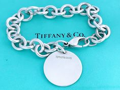 Authentic Tiffany & Co Silver Circle Tag Charm Bracelet, Rare Vintage Tiffany Company 925 Silver Round Blank Tag Plate Chain Link Bracelet by ModManDesign on Etsy Tiffany Bracelet Hardware Link, Tiffany Graduated Chain Link, Tiffany Inspired Jewelry Sterling Silver, Tiffany New York, Fashion Uniform, Tiffany And Co Bracelet, Stamp Maker, Tiffany And Co Jewelry, Round Bracelet