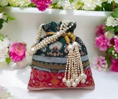 Attractive beaded potli bags for  bridal  Wedding accessories for brides. Bridal gift for wedding Luxury Elegant Festive Potli Bag, Luxury Handmade Potli Bag For Wedding, Elegant Embroidered Potli Bag For Wedding, Wedding Hand Embellished Potli Bag, Wedding Potli Bag With Intricate Embroidery, Potli Bags Wedding, Designer Potli Bags, Wedding Accessories For Bride, Attractive Colors