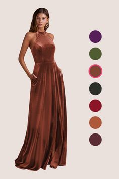 a woman in a long brown dress standing next to an assortment of color swatches