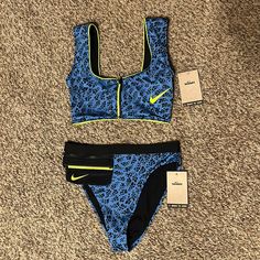 Nike Swim Collection Women’s Party Dot Bikini Set Crop Zippered Bikini Top And Matching High Waisted Bottom Blue/Black New With Tags Size Small Bundle And Save With My Other Listings!!!!! Other Nike Swimsuits And Separates Available In My Other Listings!!!!! Stock: D3 Fitted Blue Nike Swimwear, Nike Blue Swimwear For Pool, Nike Blue Swimwear, Nike Sleeveless Swimwear For Pool, Nike Sleeveless Swimwear, Nike Fitted Swimwear For Pool, Fitted Nike Swimwear For Pool, Fitted Nike Swimwear For Sports, Nike Fitted Sleeveless Swimwear