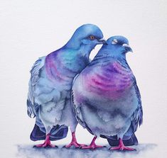 two blue birds standing next to each other on top of a white surface with watercolor paint