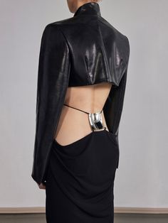 SHIPS WORLDWIDE - TAXES & DUTY ALREADY PREPAID AND INCLUDED FEATURING A SCULPTURAL SQUARE LOWER BACK PLATE, DRAWING ATTENTION TO THE BEAUTY OF THE HUMAN FORM. HIGH STRETCH AND COMFORT-FEEL JERSEY, DRAPED AT THE BACK AND CINCHED TOWARDS THE FRONT. LOW SIDE HIPS. ADJUSTABLE TIE-BACK STRAPS BEHIND THE NECK.    STYLED WITH: VERTEBRAE BRALETTE  CROPPED LEATHER BLAZER    STRETCH JERSEY  GRACE LING SIGNATURE LOGO ENGRAVED SHIPS IMMEDIATELY Plate Drawing, Human Form, Back Plate, Leather Blazer, Signature Logo, Lower Back, Back Strap, Tie Backs, Leather Skirt