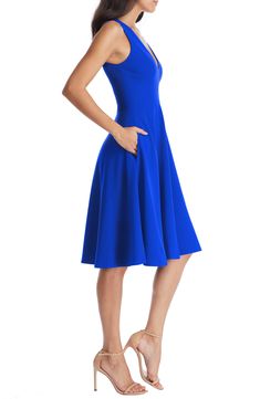 The signature drape of sleek crepe fabric brings a pleasing swing and sway to this elegant fit-and-flare dress featuring always-welcome pockets. 42" length (size Medium) Hidden back-zip closure Plunge neck Sleeveless On-seam pockets Lined 97% polyester, 3% spandex Machine wash, line dry Imported Flare Cocktail Dress, Fit And Flare Cocktail Dress, Blue Sleeveless Dress, Dinner Dress, Dress The Population, Crepe Fabric, Knee Length Skirt, Buy Dress, Nordstrom Dresses