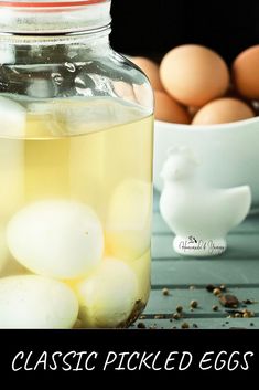 a jar filled with eggs sitting on top of a table