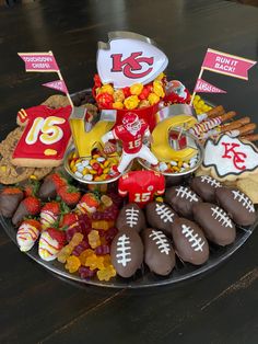 a football themed platter filled with snacks