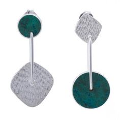 These earrings offer a contemporary elegance with their balance and contrast. Patricia Jara crafts them of polished silver featuring a textured rectangular slate. On the opposite end chrysocolla wheels offer an exquisite complement..925 Sterling silver. Opposites Attract, Halloween Decorations, Premium Quality, Dangle Earrings, 925 Sterling Silver, Sterling Silver, Halloween, Silver