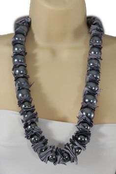 Women Fashion Necklace Neck tie necklace Trendy Fashion Western Bling Accessory Sexy Jewelry Women Links Ladies Unique Necklace Weekend Party Look Or Even Cool Work. Unique and special fashion necklace with great pendant charms for day or night wear all year around summer spring winter and fall Style : Fashion  -  Sexy Long Tie Necklace        Condition : Brand New     Color : Grey fabric + grey pearl beads          Strand length: About  35" - 40"          Necklace Drop: About 19"      Pendant S Summer Party Long Necklaces, Elegant Beaded Necklace For Holiday, Summer Party Beaded Necklaces With Large Beads, Summer Party Large Beaded Necklaces, Gray Beaded Necklaces For Party, Gray Beaded Necklace For Party, Gray Round Beads Jewelry For Party, Gray Round Bead Jewelry For Parties, Summer Party Jewelry With Large Beads