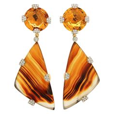 Valentin Magro Checkerboard Citrine Montana Agate Drop Earrings show off the beauty of orange. Their uppers consist of round citrines with checkerboard faceting. Below hang triangular Montana agate striped with wavy orange and edged in white. Round brilliant cut diamond covered prongs of 18k yellow gold hold the jewels together. These earrings are finished with clip backs. Measurement detail - width 0.84 inches (21 mm), length 2.36 inches (60 mm), depth 0.65 inches (17 mm). Diamond Gold Earrings, Convertible Earrings, Fringe Jewelry, Yellow Gold Drop Earrings, Montana Agate, Earrings Clip, Agate Jewelry, Vintage Clip, Pearl Earrings Dangle