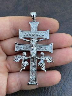 Solid 925 Silver Caravaca Cross
Double crucifix
SOLID 925 STERLING SILVER...Not plated or filled
WILL NEVER CHANGE COLOR OR YOUR MONEY BACK! Will never turn your neck green!Much attention to finest detail...from the jesus to the angels it is a fine piece of jewelry!Pendant weighs 12.5 grams
Measures 2.5x1.5" Nice Large Size
You can buy pendant only or with choice of a 3mm rope chain
Chain is made in Italy and is also solid 925 silverIf you choose to use your own chain please keep in mind t 10k Gold Chain, Red Stone Ring, High Fashion Jewelry, Moissanite Earrings, Never Change, Gold Bracelet Chain, Jewelry Pendant, Dream Jewelry, Selling Jewelry