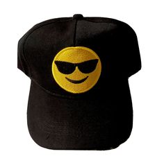 The perfect hat for never frowning and always smiling.  Wear your emotions on your head with this Smile With Sunglasses Emoji-inspired baseball cap. This Smile with Sunglasses Emoji Baseball Cap is made of high quality material that is perfect for gift to yourself and many others. It features a front embroidered design and adjustable strap. The Smile Emoji Baseball Cap is built for comfort and style, with a snapback for adjustment of size. It's the perfect accessory to let the world know how you Adjustable Baseball Cap With Smiley Face, Funny Black Snapback Baseball Cap, Playful Black Baseball Cap With Curved Brim, Trendy Baseball Cap With Uv Protection, Novelty Black Flat Bill Baseball Cap, Playful Black Snapback Baseball Cap, Fun Baseball Cap With Uv Protection, Funny Black Adjustable Snapback Hat, Fun Black Visor Hat