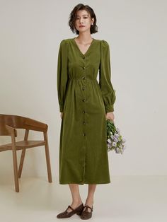 This is a feminine and romantic dress by LANGSON that is made out of high quality polyester 100% fabric. With design detail of button detail on the chest and bold buttons detail, it gives a trendy and feminine look.- Bold buttons on the front and cuffs- Puffy long sleeves- Feminine and modern mood Elegant Fall Dress With Buttoned Pockets, Casual Midi Dress With Puff Sleeves And Buttons, Solid Color Puff Sleeve Dress With Button Closure, Solid Color Puff Sleeve Dress With Buttons, Fall Dresses With Buttoned Pockets, Winter Midi Dress With Buttons, Fall Midi Dress With Buttoned Pockets, Fall Button-up Midi Dress With Buttons, Fall Midi-length Dresses With Buttoned Pockets