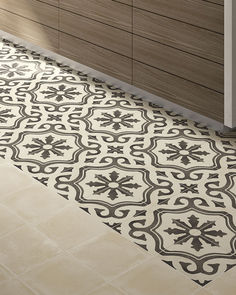 a kitchen floor with an intricate design on it's sideboard and countertop