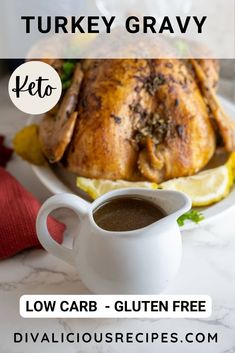 a white plate topped with a turkey covered in gravy