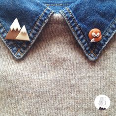 a close up of a pair of jeans with buttons on them