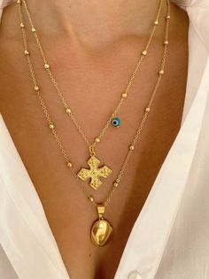 A gold cross necklace and a unique disc necklace from steell that opens and you can put inside a photo that you want. You can wear them together or separetely. In Christina Christi Jewels store you can see more than 50 designs in Women's Necklaces. You can have them in 2-4 Days with DHL EXPRESS SHIPPING MATERIALS - Gold filled Chains that are made from Steel. - Metal Cross. - Photo Charm is made from Steel. - In all necklaces I use extension at the joined edges for perfect fit. DIMENSIONS - Cros Rustic Gold Cross Necklace, Gold Cross Locket Necklace, Necklace Photo, Picture Necklace, Brown Leather Backpack, Metal Cross, Gold Cross Necklace, Photo Charms, Gold Cross Pendant