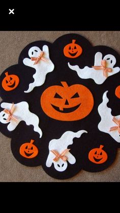 a black and white rug with halloween decorations on it