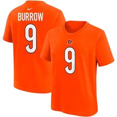 Encourage your young fan to show support for their favorite Cincinnati Bengals player with this Joe Burrow Name and Number T-shirt from Nike. It's designed as a simpler alternative to the on-field Cincinnati Bengals jerseys. Soft fabric makes this Cincinnati Bengals tee an ideal option for game day. Short sleeve Machine wash with garment inside out, tumble dry low Imported Screen print graphics Material: 100% Cotton Crew neck Brand: Nike Officially licensed Nike Sports Fan T-shirt With Team Name, Jersey T-shirt With Team Name For Fan Merchandise, Nike Jersey T-shirt For Sports Events, Nike Team Spirit Jersey T-shirt, Nike Jersey T-shirt With Team Spirit, Team Name Jersey T-shirt For Fan Merchandise, Football Season Team Logo Jersey T-shirt, Team-colored T-shirt With Letter Print For Fan Events, Sports Jersey T-shirt With Team Logo