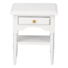 a white table with a drawer on it and a gold knob at the top, against a white background