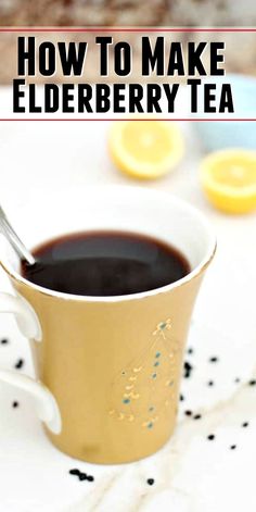 a cup of elderberry tea with lemons in the background and text overlay that reads how to make elderberry tea