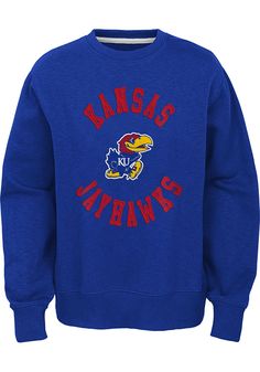 Let your little fan feel like one of the team in this Kansas Jayhawks Youth Blue The Come Back Crew Sweatshirt! They'll love showing off their pride in this KU Jayhawks Jayhawks Crew Neck Shirt, which features a direct embroidery team graphic on center chest. Cotton Throwback Sweatshirt For Fan Gear, Cotton Throwback Fan Gear Sweatshirt, Blue Fleece Fan Merchandise Sweatshirt, Casual Sweatshirt With Embroidered Logo For Fans, Casual Sweatshirt With Embroidered Graphics For Fans, Team Logo Cotton Sweatshirt For Fall, Fall Team Logo Cotton Sweatshirt, Collegiate Cotton Sweatshirt With Team Logo, Fall Cotton Sweatshirt With Team Logo