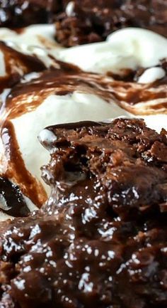 chocolate cake with ice cream and caramel drizzle on top, ready to be eaten