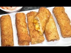 some fried food is on a white plate