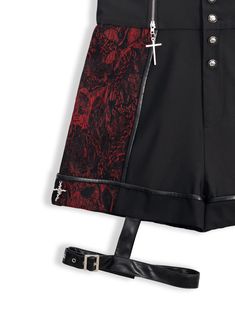 Unleash your inner vamp with these stunning high-waist shorts, a perfect blend of gothic charm and modern edge. Crafted from luxurious vampire red jacquard and contrasting black fabric patches, these shorts are designed to make a bold statement. The high-waist fit is accentuated with zippers adorned with cross charms, adding a touch of gothic allure. The leg loop feature enhances the edgy aesthetic, while the rosette crosses at the cuffs provide a delicate, yet darkly romantic touch. The lace-up Black Gothic Shorts For Alternative Fashion, Gothic High Waist Fitted Shorts, Gothic Black Shorts, Gothic Black Shorts For Night Out, Edgy Red Bottoms For Halloween, Gothic Red Bottoms For Alternative Fashion, Gothic Red Bottoms For Halloween, Black Halloween Shorts, Vampire Fashion