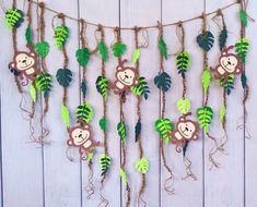 monkey themed garland with green leaves and vines