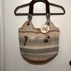 Questions? Leave A Comment Below! I Got This Bag A Few Years Back And Just Never Used It. Tag Still Attached. Has One Outside Zip Pocket, One Small Outside Open Pocket, Large Inside Zip Pocket And Two Open Inside Pockets. Has Top Zipper Closure. Colors Are Different Variations Of Tan And Some Gray Stripes. Casual Cream Crochet Bag, Casual Cream Crochet Bag With Handles, Casual Everyday Neutral Crochet Bag, Everyday Neutral Crochet Shoulder Bag, Beige Crochet Hobo Bag, Crochet Shoulder Bag In Neutral Color For Everyday Use, Beige Crochet Hobo Bag For Everyday, Neutral Crochet Shoulder Bag For Everyday Use, Crochet Beige Hobo Bag For Travel