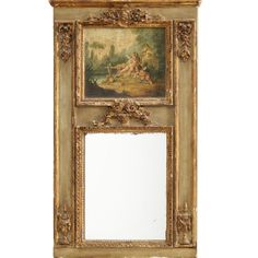 an ornate gold frame with a painting on it