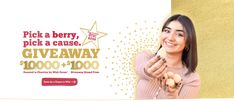 a woman holding up a cookie in front of her face and the words pick a berry, pick a cause giveaway $ 1, 000 + 100