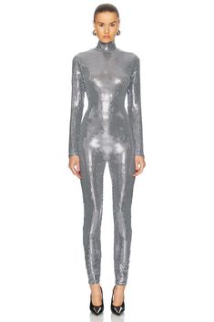 66% polyamide 30% polyester 4% elastane.  Made in Portugal.  Hand wash.  Hidden back zipper closure.  Mockneck design.  Sequin embellished fabric.  .  .  .  .  .  .  .  .  .  . Disco Jumpsuit, Embellished Fabric, Ski Club, Gunmetal Grey, Mock Neck, Metallic Silver, Jumpsuit Romper, All In One, Skiing