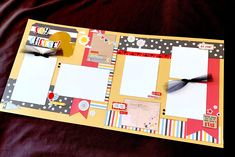 an open scrapbook with some papers attached to it