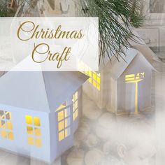 two small white houses sitting next to each other with the words christmas craft above them