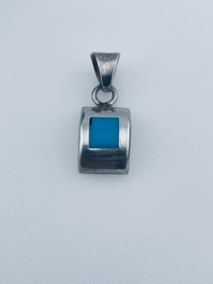 Metal: sterling silver Stones: turquoise Carat weight: n/a Color of stones: Blue Clarity: n/a Size: n/a Weight: 5.04 grams Modern Turquoise Sterling Silver Jewelry, Silver Sterling Turquoise Necklace With Rectangular Pendant, Sterling Silver Turquoise Necklace Stamped 925, Turquoise Pendant Necklace In Sterling Silver, Silver Dangle Turquoise Necklace In Sterling Silver, Silver Turquoise Dangle Necklace In Sterling Silver, Turquoise Dangle Necklace In Sterling Silver, Denver Co, Vintage Turquoise